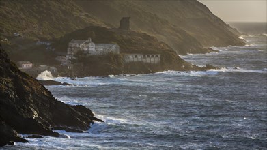Coast with the dilapidated Convent of St. Francois in Marine de Scalo near Pino