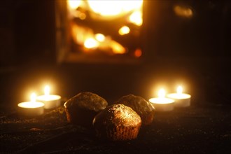 Chocolate muffins and tea light candles