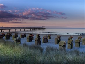 Beach chairs on the beach at dusk