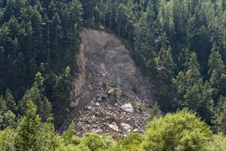 Landslide on a hillside along the Route des Grandes Alpes mountain road