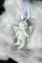 Small white angel