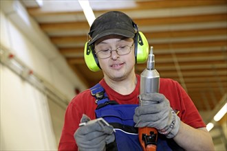 Man with Down syndrome at work