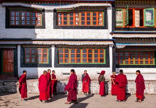Buddhist monks outside Galden Namgey Lhatse Monastery