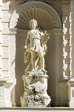 Decorative statue in a niche on the west facade