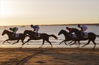 Horse race at the beach of Sanlucar de Barrameda at the Guadalquivir river mouth