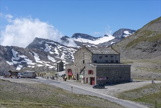 Inn and church made of natural stone at Col de l'Iseran mountain pass