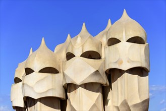 Sculptural ventilation shafts on the roof of Casa Mila or La Pedrera by Antoni Gaudi