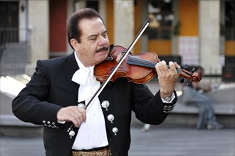 Mexican musician performing in Plaza Garibaldi