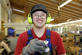 Man with Down syndrome at work