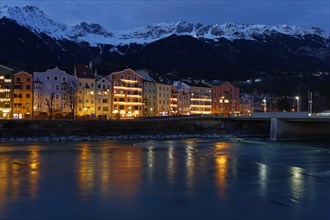 Buildings on the Inn River at dusk