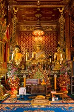Golden Buddha statues in Wat Phrah Singh Temple