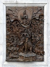 Relief at Wat Traimit Temple