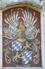 Alliance coat of arms on the castle wall