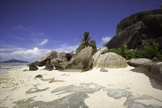 Typical rock formations in the Seychelles at a sandy beach