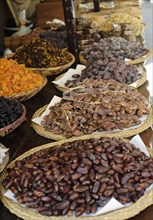 Dried fruit for sale in market stall at the annual All Saints Market in Cocentaina