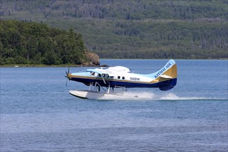 Seaplane taking off on the water
