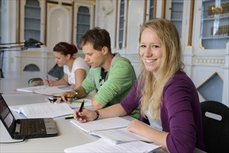 Students studying in the departmental library of the University of Hohenheim in Schloss Hohenheim Palace