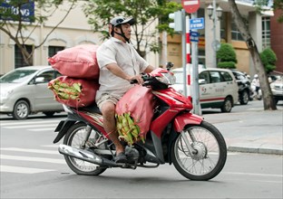 Man on a packed bike