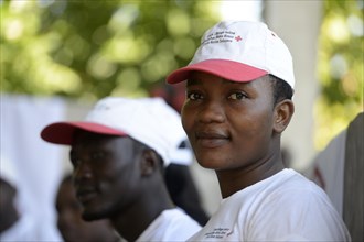 Young woman attending a training session for disaster relief workers at the Red Cross
