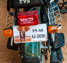 Indian motor scooter license plate with elephant motif