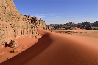 Eroded sandstone rocks and sand dunes at the Cirque
