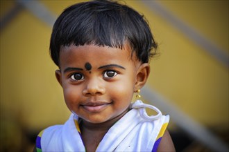 Smiling girl with a bindi