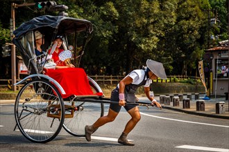 Rickshaw with passengers