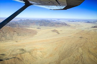 View from a small plane over the foothills of the Namib Desert