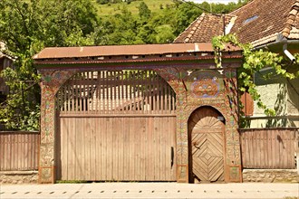 Traditional folk art painted and carved wooden Szekely gate