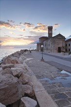 Promenade with Church of San Clemente