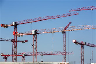 Construction cranes at a construction site