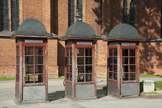 Three telephone booths