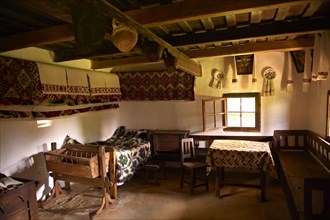 Rustic interior of the 1798 wooden house from the Iza Valley