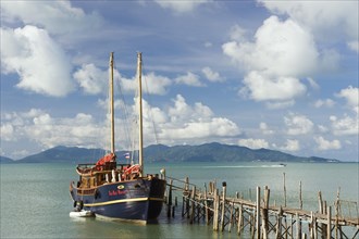 Sailing boat at a jetty