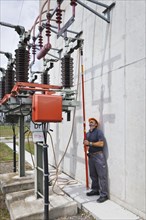 Special engineer during outdoor work at a substation of transmission network operator 50Hertz
