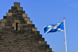 The Scottish flag blowing in Edinburgh Castle