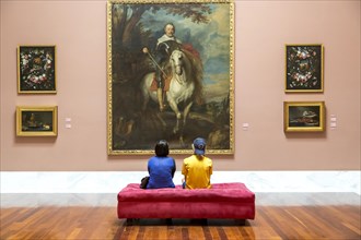 Two teenagers in front of a painting in the Museo de Bellas Artes de Valencia