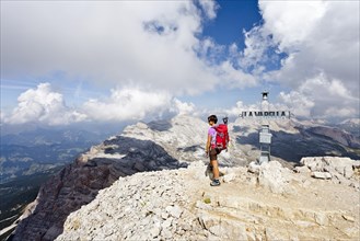 Mountain climber on the summit of Lavarela Massif