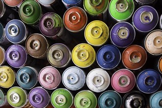 Coloured spray paint cans