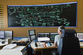 Engineer sitting at his work station in the Transmission Control Center