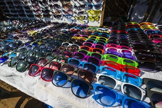 Colourful sunglasses for sale at the weekly flea market
