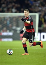 Bastian Schweinsteiger wearing the away strip
