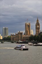 View from Hungerford Bridge on the Houses of Parliament and Elizabeth Tower clock tower