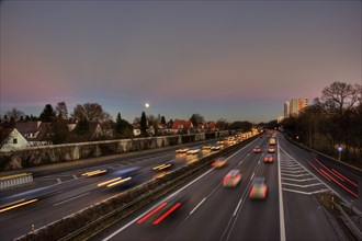A96 motorway at dusk with light trails of moving cars