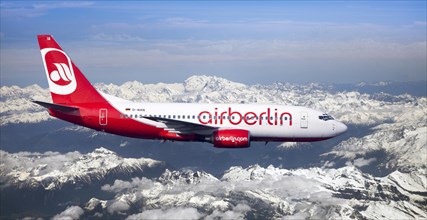 Air Berlin Boeing 737-73S in flight over the Alps