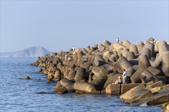 Concrete tetrapods protect the coast from waves and stormy tides near the Port of Heraklion