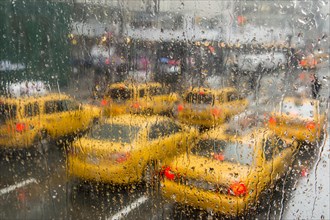 Taxis in the rain