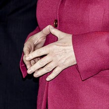 Typical hand position of Angela Merkel