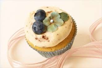 Cup cake with blueberries