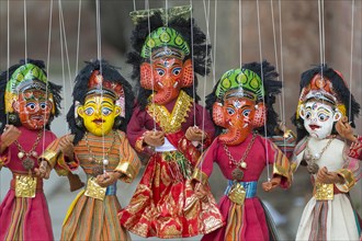 Ganesh puppets on sale at a market stall